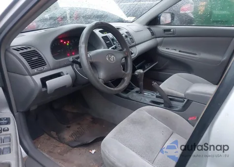 2002 Toyota Camry Le from USA, damaged, VIN 4T1BE32K92U011709